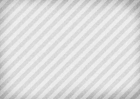 White diagonal striped paper background with vignetteの写真素材