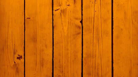 Background orange wooden planks board textureの写真素材