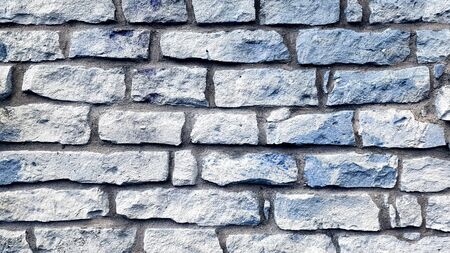 Blue and white brick wall texture backgroundの写真素材