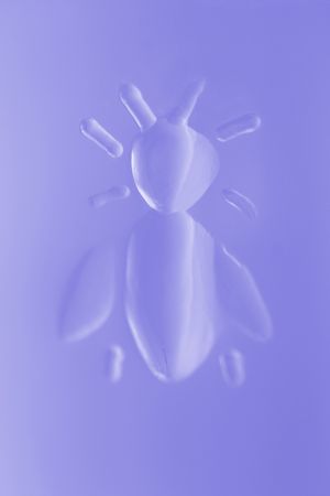 Photo of a Black and White Pressed Glass Honey beeの写真素材