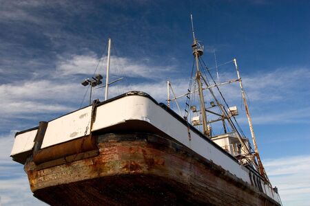 Photo of a fishing boat in dry dock, Astoria, Oregonの写真素材