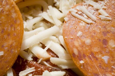 Macro shot of uncooked pepperoni pizza.の写真素材