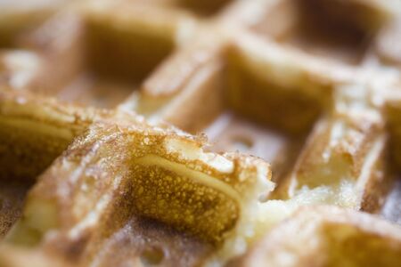 Photo of a Belgian waffle shot up close with a macro lens.