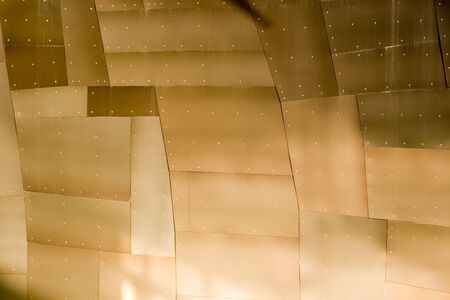 Abstract view of a metal building with various metallic colors.の写真素材
