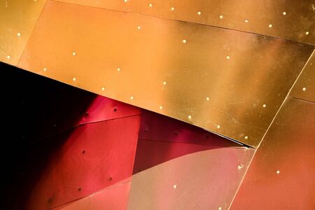 Abstract view of a metal buildiing with various metallic colors.の写真素材