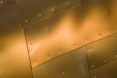 Abstract view of a metal buildiing with various metallic colors.の写真素材