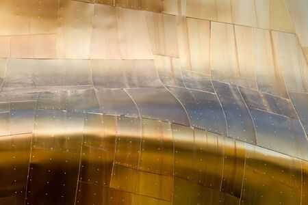Abstract view of a metal buildiing with various metallic colors.の写真素材