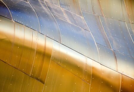 Abstract view of a metal building with various metallic colors.の写真素材