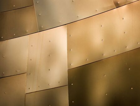 Abstract view of a metal buildiing with various metallic colors.の写真素材