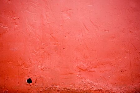 Red hull of a fishing boat suitable for a red background.の写真素材