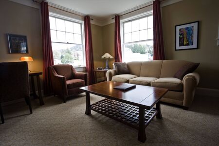 Contemporary living room with couch, chair and coffee table.の写真素材