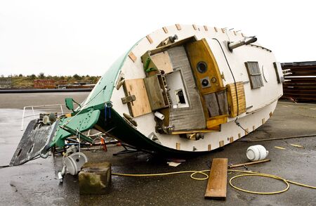 Photo of a boat in drydock that was knocked over by hurricane force winds in Astoria, Oregon.
