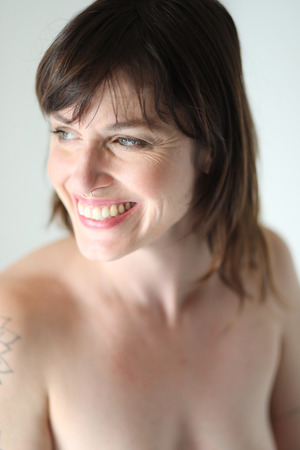 Photo of a very attractive adult woman with brown hair and eyes.の写真素材