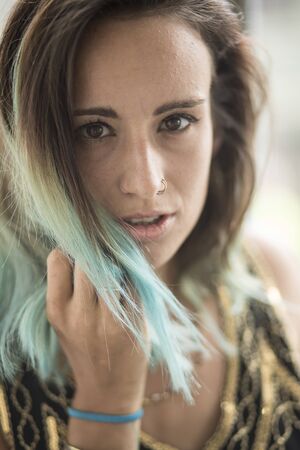 Photo of a very attractive woman with beautiful brown eyes.