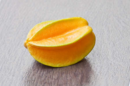 Star apple fruit on the brown tile floor 