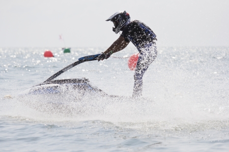 CHONBURI, THAILAND-DECEMBER 8  Unidentified Jet Ski driver in action during Jet Ski Kingのeditorial素材