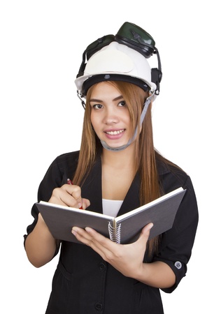 Female engineer with a diary on white backgroundの写真素材