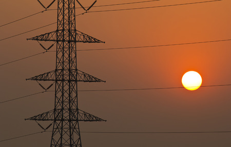 High voltage towers at sunset in thailand.