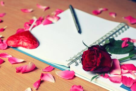 happy Valentine's day on the romantic holiday. the concept of condom,Rose and chocolate heart on pink background.の写真素材