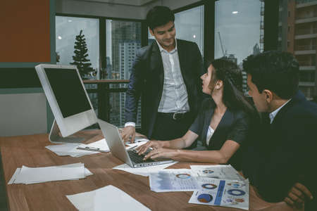 Business partners discussing documents and ideas at meeting background concept.の写真素材