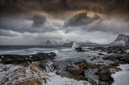 Lofoten is a chain of islands far north on the coast of Norway.  Lofoten is an absolutely incredible place. It's gorgeous and dramatic, with mountains growing straight out of the ice-cold waters.の写真素材