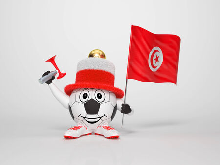 A cute and funny soccer character holding the national flag of Tunisia and a horn dressed in the colors of Tunisia on bright background supporting his teamの写真素材