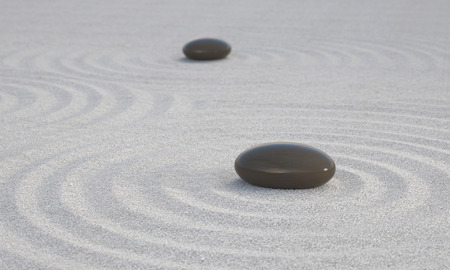 Dark Zen stones on white sand symbol for calmness harmony and spirituality