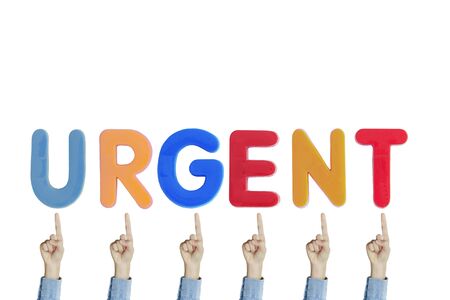 Hands point to wording GRGENT