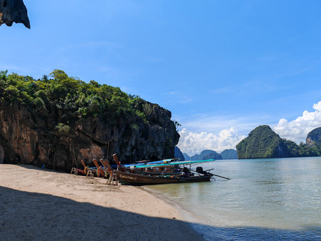 Traditional Longtail Boats on Tropical Beachの写真素材