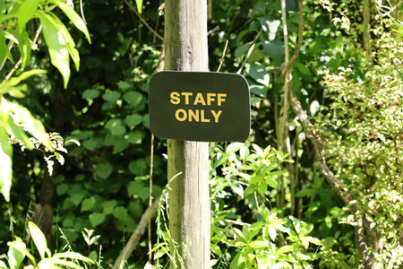 Staff only warning sign in garden
