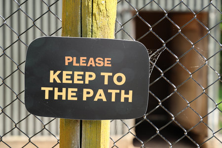 Please keep to the path warning signの写真素材