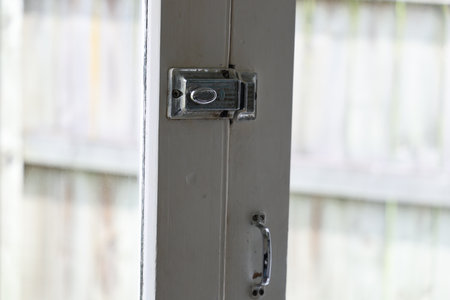 Vintage Window Latch Handle Closeup Indoorsの写真素材