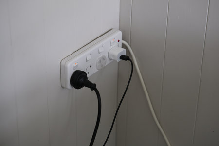 Wall Power Outlet Panel Connected Cables