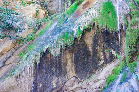 Waterfall from ravine.waterfall from the mountain river. rapid currentの写真素材