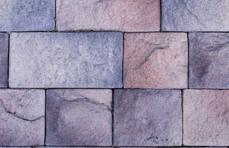 New stone cladding plates on wall closeup