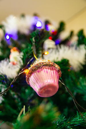 Decorated Christmas tree on blurred, sparkling and fairy backgroundの写真素材
