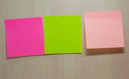Goal. business woman hand pointing with colored sheets sticky note paper on white board background...