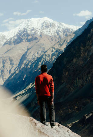 Man looking at the mountainsの写真素材