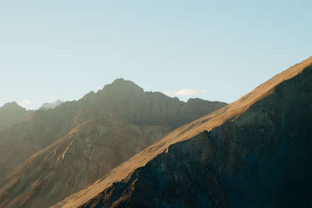 arid mountainside at sunset in Nubra Valley, Ladakh, Indiaの写真素材