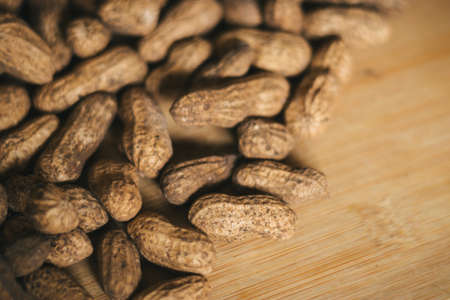 peanuts on a wooden backgroundの写真素材