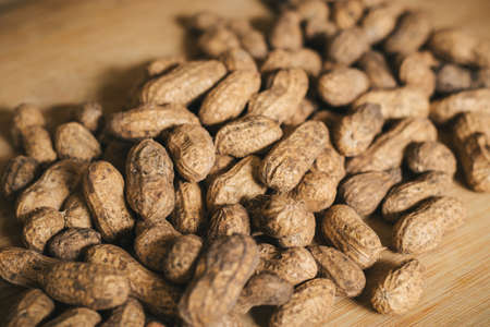 peanuts on a wooden backgroundの写真素材