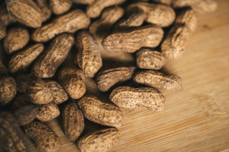 peanuts on a wooden backgroundの写真素材