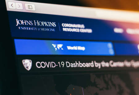 Johns Hopkins University COVID-19  Dashboard closeup on a monitor.