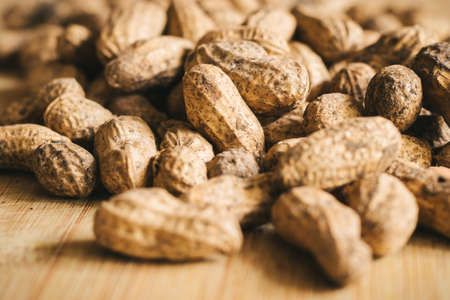peanuts on a wooden backgroundの写真素材