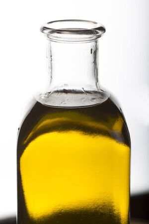 Olive oil in glass bottleの写真素材
