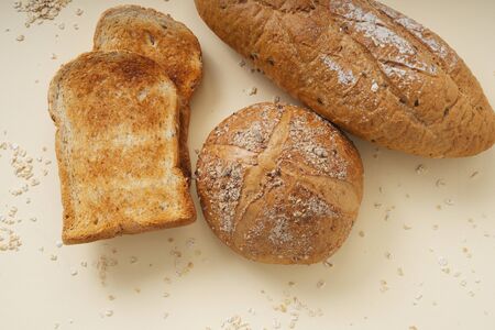 Group of many type of bread on a plate. Top view.の写真素材