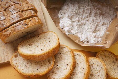 Group of many type of bread on a plate and cooking flour.の写真素材