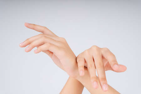 Woman hands scrubbing isolate over white background.