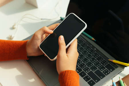 Student study from home with smartphone and laptop.の写真素材