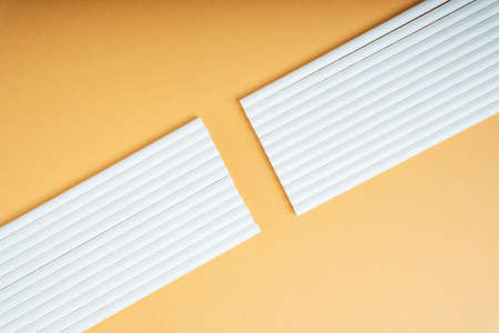 Group of white straw shape cut in the middle.の写真素材